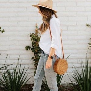 Round ratan whicker crossbody bag